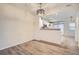 Dining area adjacent to kitchen showcases tile floors and modern lighting at 18847 E Yale Cir # D, Aurora, CO 80013