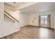 Spacious living room with hardwood floors and natural light at 18847 E Yale Cir # D, Aurora, CO 80013