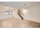 Bright living room with hardwood floors and staircase at 18847 E Yale Cir # D, Aurora, CO 80013