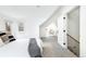 Bright bedroom with soft carpet, a decorative rug, and a comfortable sitting area at 840 S Pennsylvania St, Denver, CO 80209