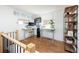 Office space featuring standing desks, hardwood floors, and neutral paint at 840 S Pennsylvania St, Denver, CO 80209