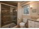 Updated bathroom with a large shower and granite vanity at 6941 S Poplar Way, Centennial, CO 80112