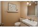 Small bathroom with granite vanity and updated fixtures at 6941 S Poplar Way, Centennial, CO 80112