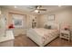 Charming bedroom with window seat and floral bedding at 6941 S Poplar Way, Centennial, CO 80112