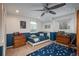 Themed bedroom with built in dresser and star rug at 6941 S Poplar Way, Centennial, CO 80112