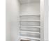 Walk-in pantry provides ample shelving for storage and organization at 8807 Sedalia St, Commerce City, CO 80022