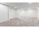 Open basement with neutral carpet, recessed lights, closet and utility room access at 5914 S Kearney St, Centennial, CO 80111