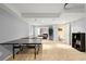 Finished basement offers ping pong, bathroom, and bedroom access at 1118 S Duquesne Cir, Aurora, CO 80018