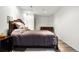 Bedroom with wood-look floors, neutral walls, and a full bed at 1118 S Duquesne Cir, Aurora, CO 80018
