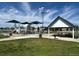 Community park with a playground and covered picnic tables at 1118 S Duquesne Cir, Aurora, CO 80018
