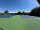 Community tennis courts on a sunny day at 1118 S Duquesne Cir, Aurora, CO 80018