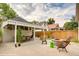 Spacious backyard with a well-maintained patio, fire pit, and lush greenery perfect for entertaining at 284 S Lafayette St, Denver, CO 80209