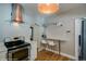 Modern kitchen with stainless steel appliances, breakfast bar, and open layout perfect for entertaining at 284 S Lafayette St, Denver, CO 80209