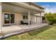 Covered patio with comfortable seating, ideal for relaxing and entertaining guests outdoors at 8510 Independence Way, Arvada, CO 80005