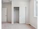 Bedroom featuring a closet and a neutral decor with a modern design at 453 Interlocken Blvd # 103, Broomfield, CO 80021