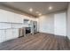 Modern kitchen with white cabinets and stainless steel appliances at 12983 W Ida Ave # 401, Littleton, CO 80127