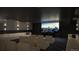 Modern theater room with comfortable seating and large screen at 12983 W Ida Ave # 401, Littleton, CO 80127