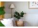 Cozy living room detail with stylish decor, including plants, pillows and modern accents at 1842 S Fairfax St, Denver, CO 80222