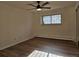 Comfortable bedroom featuring wood floors and window at 1270 N Marion St # 103, Denver, CO 80218