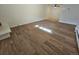 Spacious living room with wood floors and ceiling fan at 1270 N Marion St # 103, Denver, CO 80218