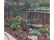 Well-maintained backyard garden with colorful flowers and stone accents at 3512 Cascina Pl # A, Highlands Ranch, CO 80126