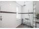 Modern bathroom with a walk-in shower and updated fixtures at 3512 Cascina Pl # A, Highlands Ranch, CO 80126