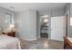 Main bedroom with ensuite bathroom access, featuring modern flooring at 3512 Cascina Pl # A, Highlands Ranch, CO 80126