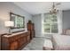 Serene bedroom with an arched window and ample closet space at 3512 Cascina Pl # A, Highlands Ranch, CO 80126