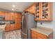 Kitchen with stainless steel refrigerator and cabinets at 3512 Cascina Pl # A, Highlands Ranch, CO 80126