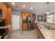 Bright kitchen with stainless steel appliances and wood cabinets at 3512 Cascina Pl # A, Highlands Ranch, CO 80126