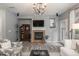 Living room features a fireplace and hardwood floors at 3512 Cascina Pl # A, Highlands Ranch, CO 80126