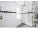 Modern shower with subway tile and glass block feature at 3512 Cascina Pl # A, Highlands Ranch, CO 80126