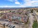 Wide aerial perspective of a complex, showcasing location and mountain views at 2428 W 82Nd Pl # 2D, Westminster, CO 80031