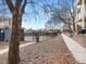 Community pool area featuring black wrought iron fence, and brick knee-wall, with sidewalk at 2428 W 82Nd Pl # 2D, Westminster, CO 80031