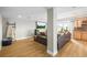 Finished basement with wet bar, mini fridge, spacious media area, and ladder with hanging blanket at 743 Briar Haven Dr, Castle Pines, CO 80108