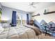 bedroom featuring playful decor, mountain wall art, and a window with shutters offering style and ample sunlight at 743 Briar Haven Dr, Castle Pines, CO 80108