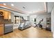 Home gym featuring exercise equipment and a refreshment bar, promoting a healthy lifestyle within the comfort of your home at 743 Briar Haven Dr, Castle Pines, CO 80108