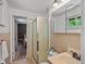 Small bathroom with glass shower stall and medicine cabinet mirror at 3030 Alkire St, Golden, CO 80401