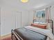 Bedroom with hardwood floors and an oversized closet at 3030 Alkire St, Golden, CO 80401