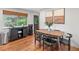 Dining room includes modern lighting and opens to the backyard at 3030 Alkire St, Golden, CO 80401