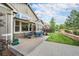 Relaxing patio area with nice yard and landscaping at 13942 W 87Th Dr, Arvada, CO 80005