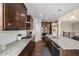 Well-equipped kitchen with stainless steel appliances and granite countertops at 13942 W 87Th Dr, Arvada, CO 80005