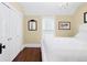 Bright bedroom featuring hardwood floors, a closet, and natural light at 3147 Vallejo St, Denver, CO 80211