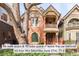 Charming Victorian home with a well-manicured front yard, mature trees, and inviting curb appeal at 3147 Vallejo St, Denver, CO 80211