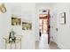Hallway with bar cart and decor leading to the home's interior at 3147 Vallejo St, Denver, CO 80211