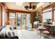 Stylish outdoor kitchen features stone accents, stainless steel grill, and cozy seating area at 3147 Vallejo St, Denver, CO 80211