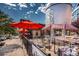 Exterior patio with iron furniture and umbrellas at 3147 Vallejo St, Denver, CO 80211