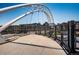 Modern pedestrian bridge featuring unique architectural design and city views at 3147 Vallejo St, Denver, CO 80211