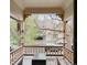 Cozy covered porch with outdoor seating offers a relaxing view of the neighborhood at 3147 Vallejo St, Denver, CO 80211