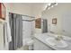 Simple bathroom with shower/tub combo and black and white decor at 796 Chimney Creek Dr # B, Golden, CO 80401